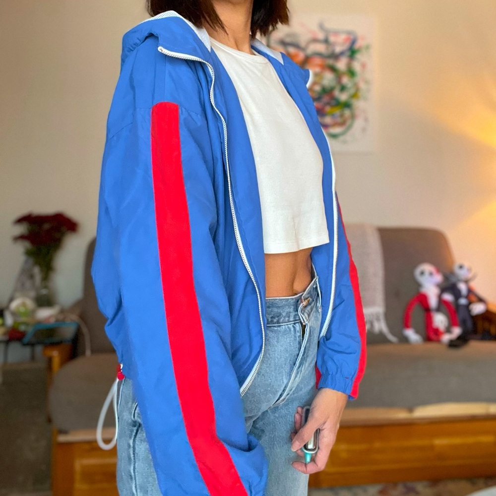 Blue and red windbreaker jacket with hood